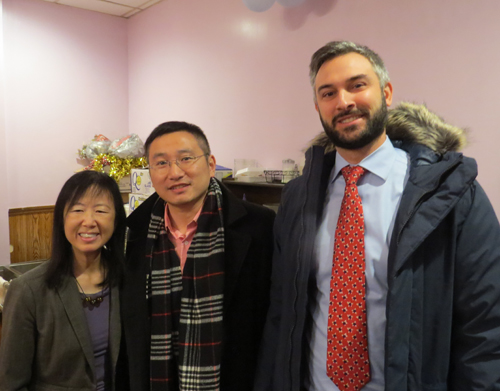 Attorney Debbie Yue, Zhenting Men from the Cleveland International Fund and Alexander Lackey from the City of Cleveland Mayor's Office