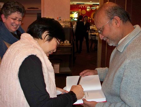 Margaret Wong autographs her book for Asim Datta