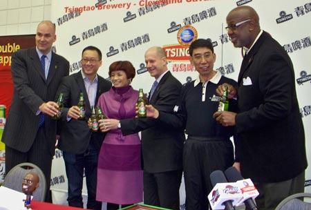 Danny Ferry, Kenneth Huang, Xu Yan, Len Komoroski, Guo Yu Sun and Campy Russell toast the agreement