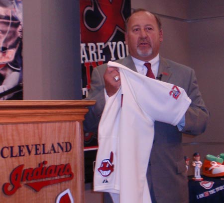 Bob DiBiasio showing the Herb Score patch on the Cleveland Indians 2009 uniforms