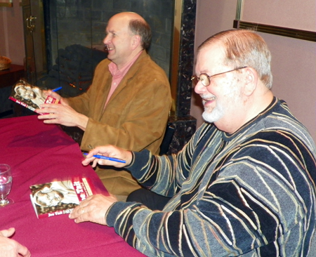 Terry Pluto and Joe Tait sign books