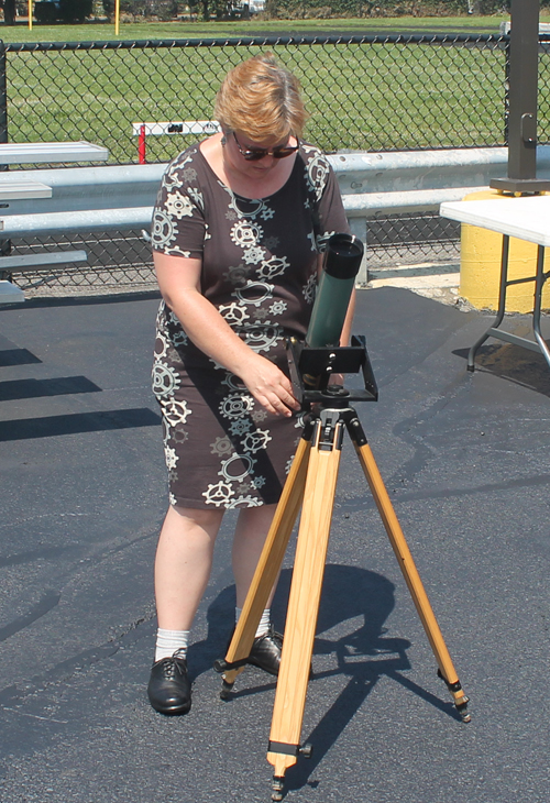 Physics and Astronomy teacher Lucy Kulbago setting up the telescope