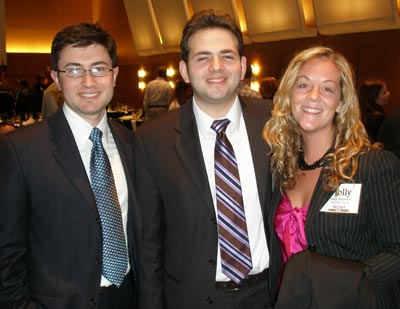 O-Web's Alex Yakubovich and Stan Garber with Holly Therrien