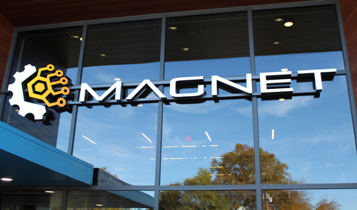 MAGNET sign on new building