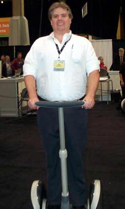 Dan Hanson riding a Segway on the first day it was released