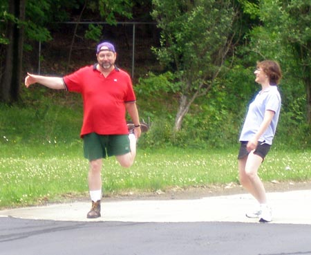 Gary Baney and Heidi Hooper stretching before the race