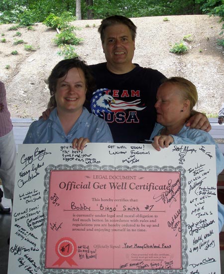 Doreen Skonier, Dan Hanson and Nancy Cramer with Bingo Smith card