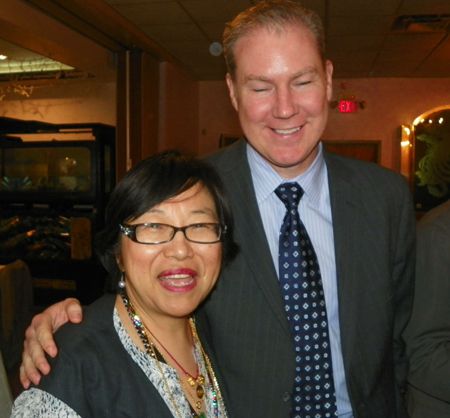 Immigration Attorney Margaret Wong and Huntington National Bank President Dan Walsh