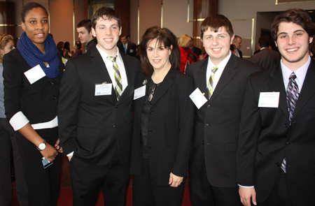 City of Beachwood Community Services Director Karen Carmen (center) and Beachwood High School students Telly Mattocks, Michael Bohm, Brian Diamond and Michael Perrino