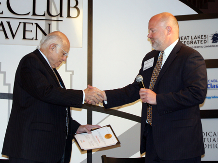 Harlan Diamond accepting award from American Red Cross