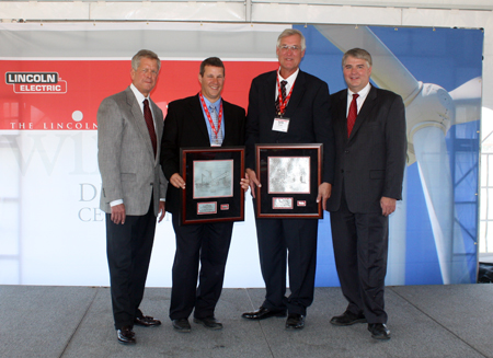Lincoln Electric CEO John Stropki Jr with key project leaders` Lincoln president George Blankenship