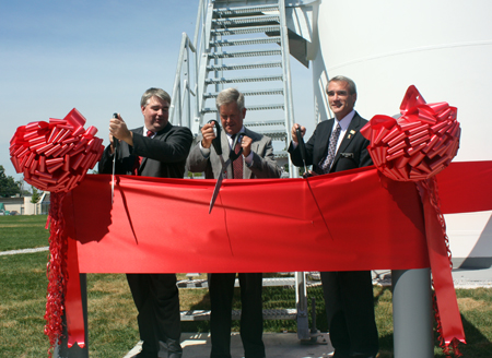 John Stropki Jr., CEO of Lincoln Electric, George Blankenship, president of Lincoln Electric North America and Euclid Mayor Bill Cervenik cut the ribbon at the dedication of the new 443' tall Lincoln Electric Wind Turbine