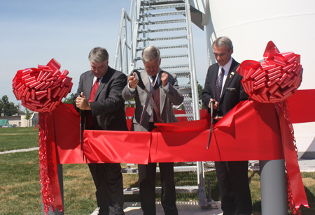 John Stropki Jr., CEO of Lincoln Electric, George Blankenship, president of Lincoln Electric North America and Euclid Mayor Bill Cervenik cut the ribbon at the dedication of the new 443' tall Lincoln Electric Wind Turbine