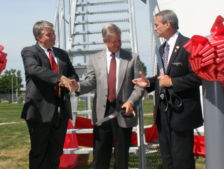John Stropki Jr., CEO of Lincoln Electric, George Blankenship, president of Lincoln Electric North America and Euclid Mayor Bill Cervenik cut the ribbon at the dedication of the new 443' tall Lincoln Electric Wind Turbine