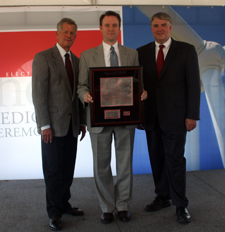 Lincoln Electric CEO John Stropki Jr with Cuyahoga County Executive Ed Fitzgerald and Lincoln president George Blankenship