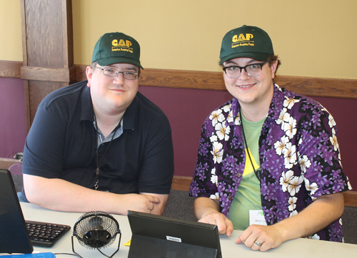 Computers Assisitng People tean members Bill Davis and Matt Luceen in their new CAP caps