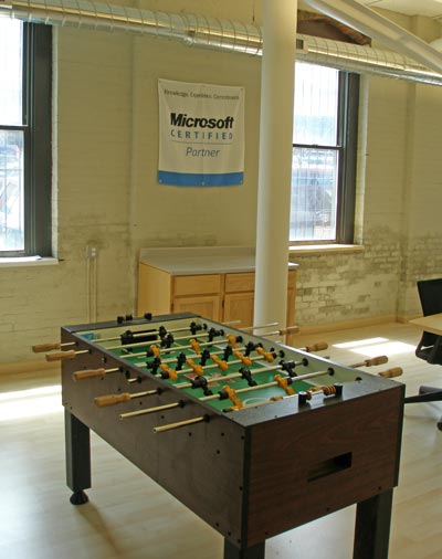 Open spaces, high ceilings, cool ductwork and a foosball table in Aztek's new space