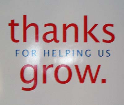 Aztek Tenth Anniversary Celebration - Thanks for Helping Us Grow sign