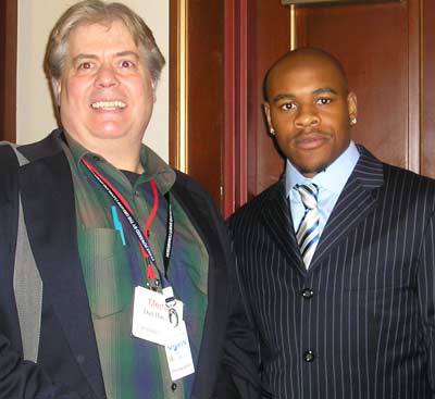 Dan Hanson with Ted Ginn Jr.