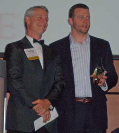 Presenter Dan McMullen with award winner A.J. Hyland