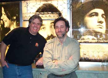 Dan Hanson and Bob Coppedge at 2nd City in front of John Belushi and Gilda Radner photos